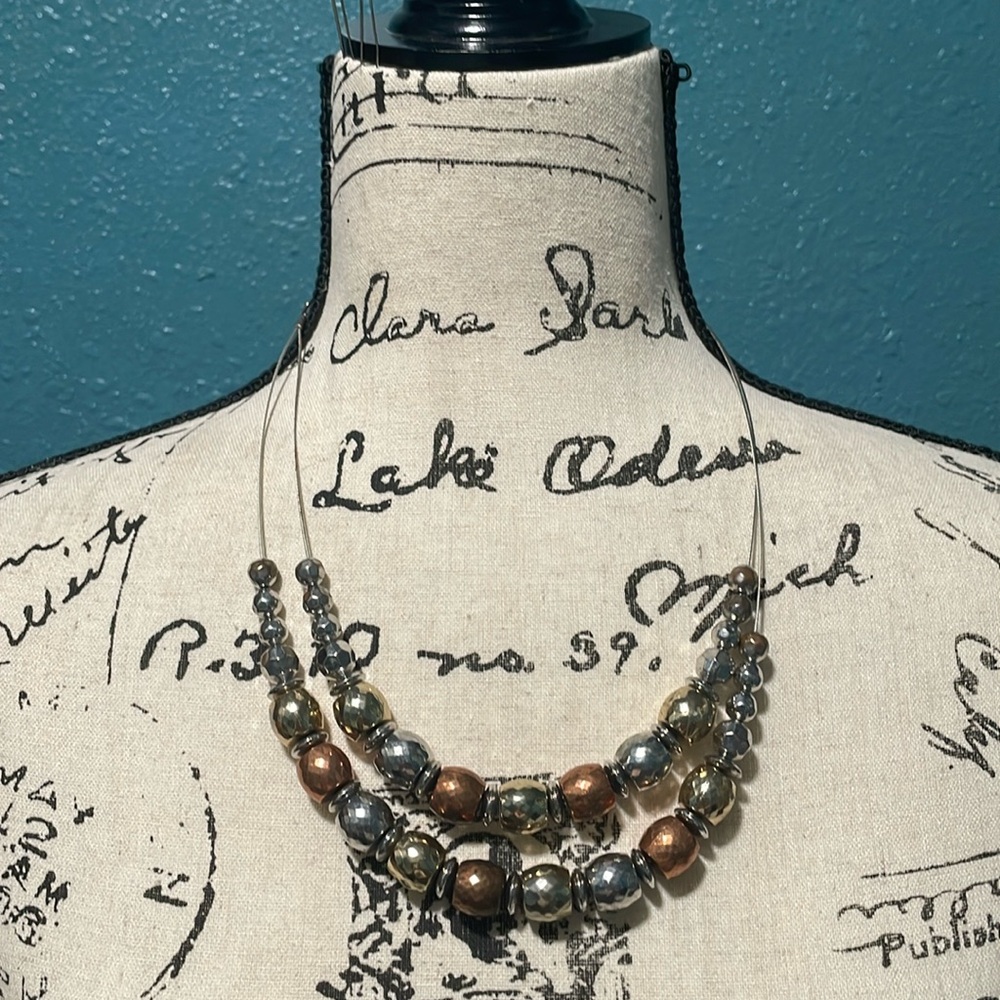 Double 2 stranded wired w/copper, gold, silver colored  beads & extender chain.